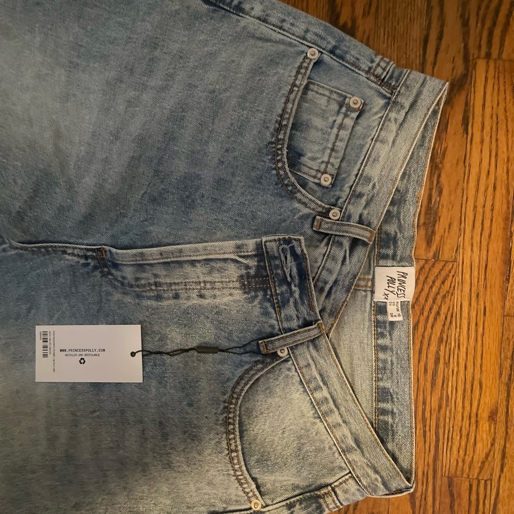 *brand new holly asymmetrical denim in light wash